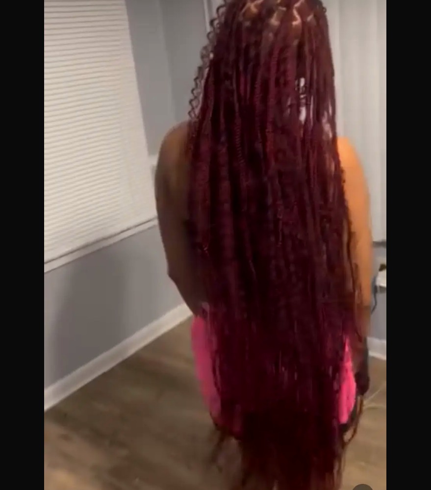 Burgundy knotless braids down the back