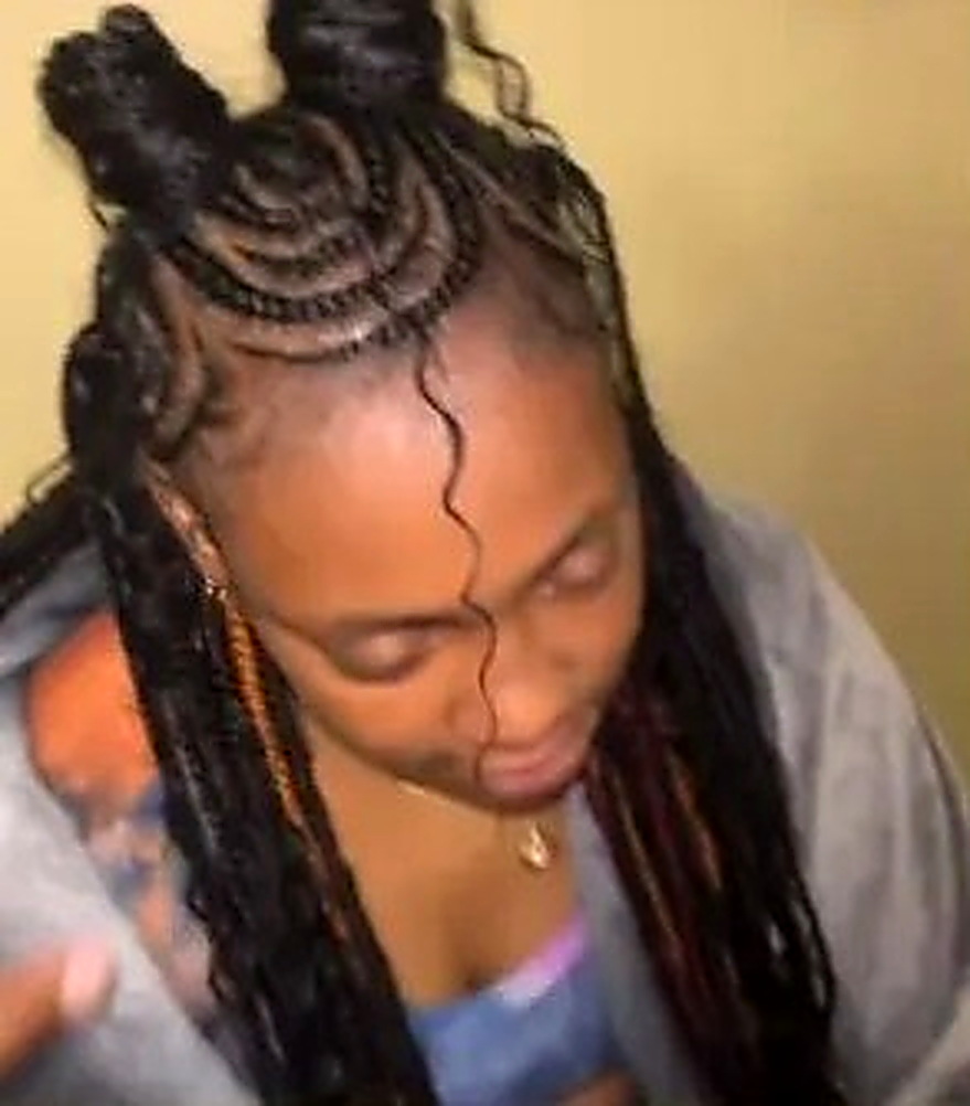 Half-up braided bun with feed-in braids
